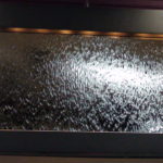 blackened copper trim glass mirror wall fountain waterfall