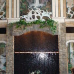 indoor custom home waterfall feature marble tiered