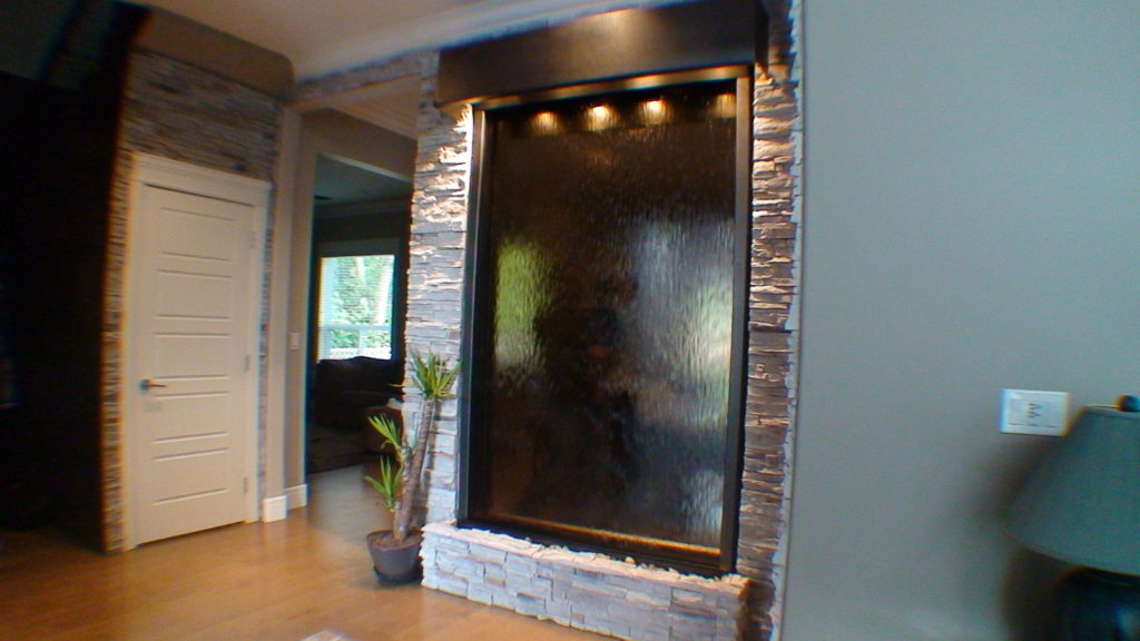 indoor custom water wall with lighting black trim