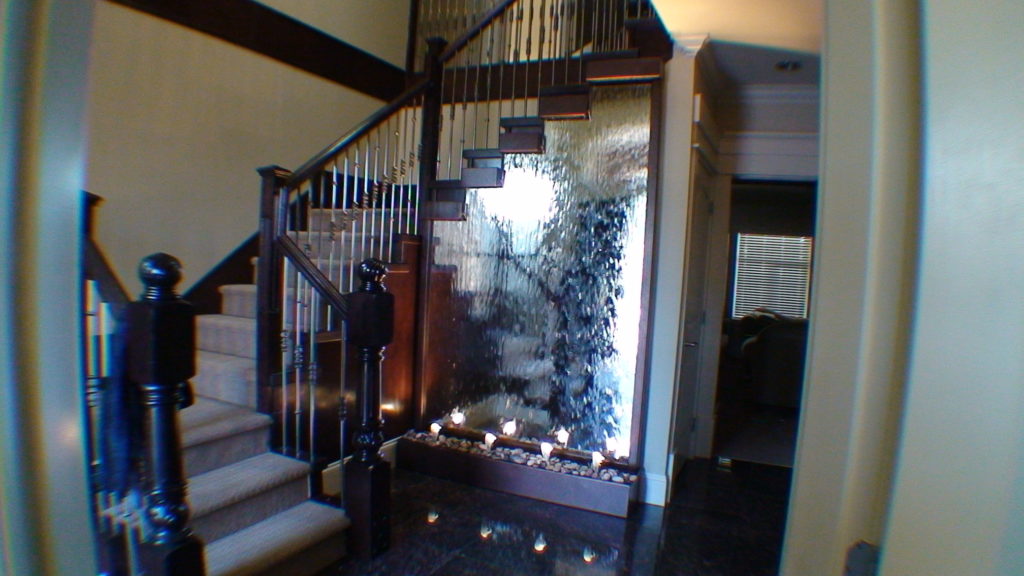 mirror glass waterfall indoor stairwell
