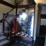 mirror glass waterfall indoor stairwell