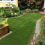 small garden landscape with artificial turf